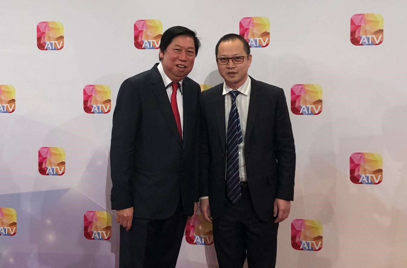 亚视行政总裁吴雨与88858cc永利官网总裁李波